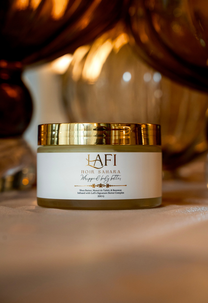 Gold and white lafi body butter jar with 'LAFI' branding on a blurred background